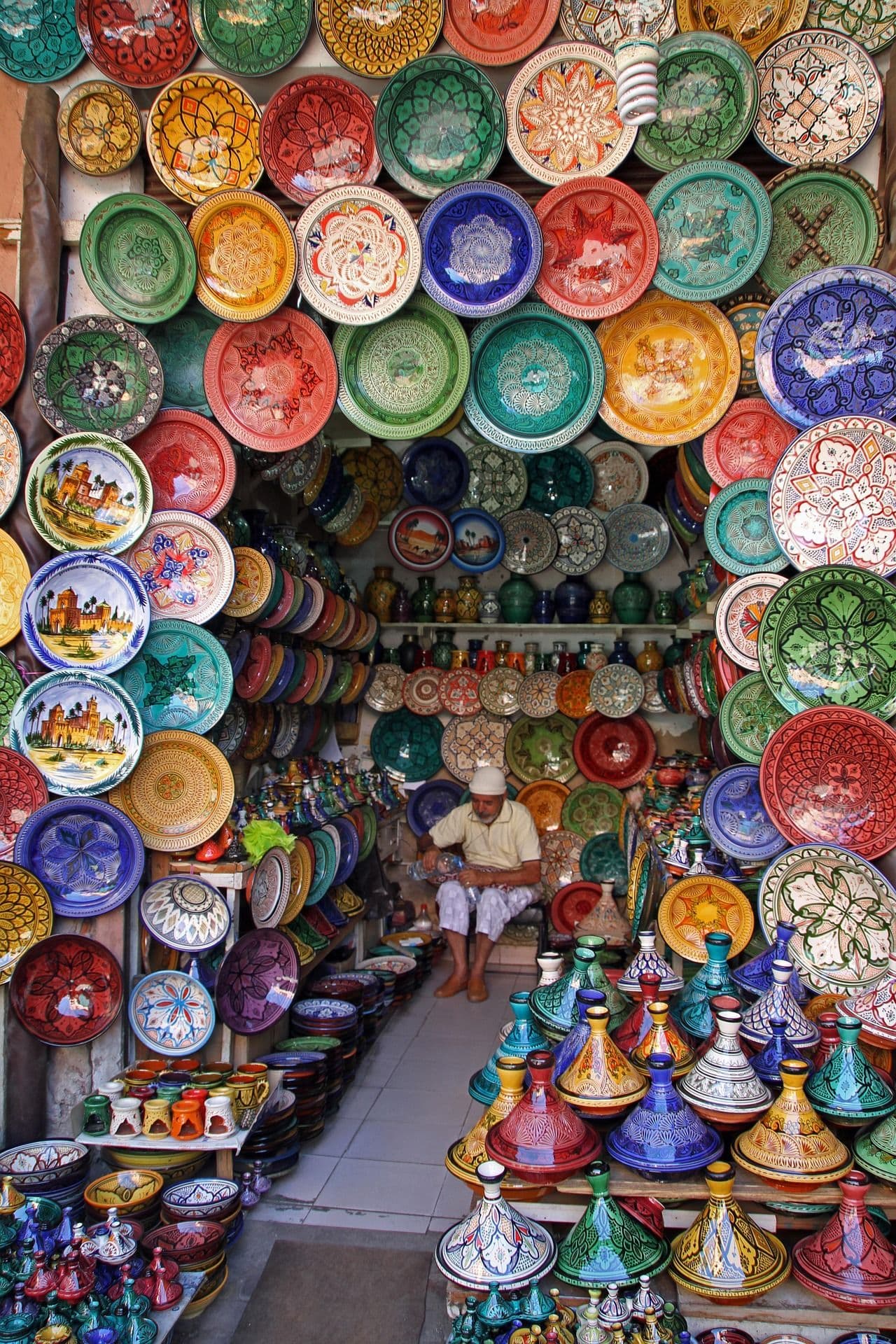 Shelves of hand-painted Moroccan ceramic plates and bowls
